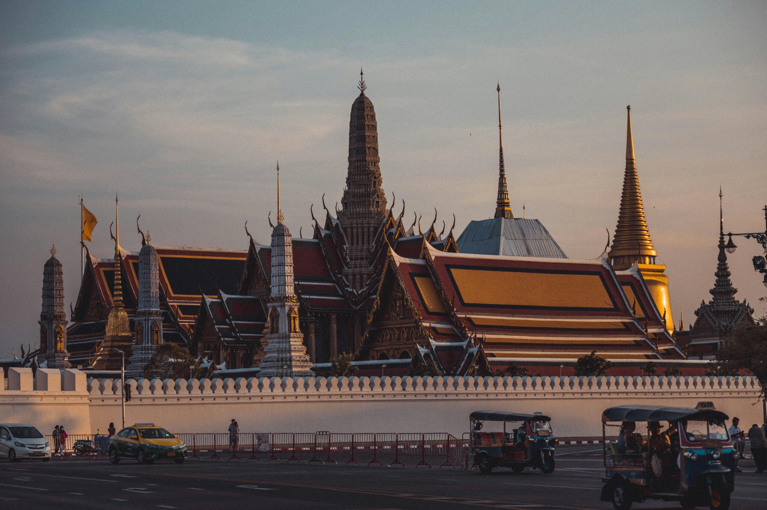 Captivating photo of Wat Phra Kaew temple in Bangkok, showcasing its intricate architecture at dusk.